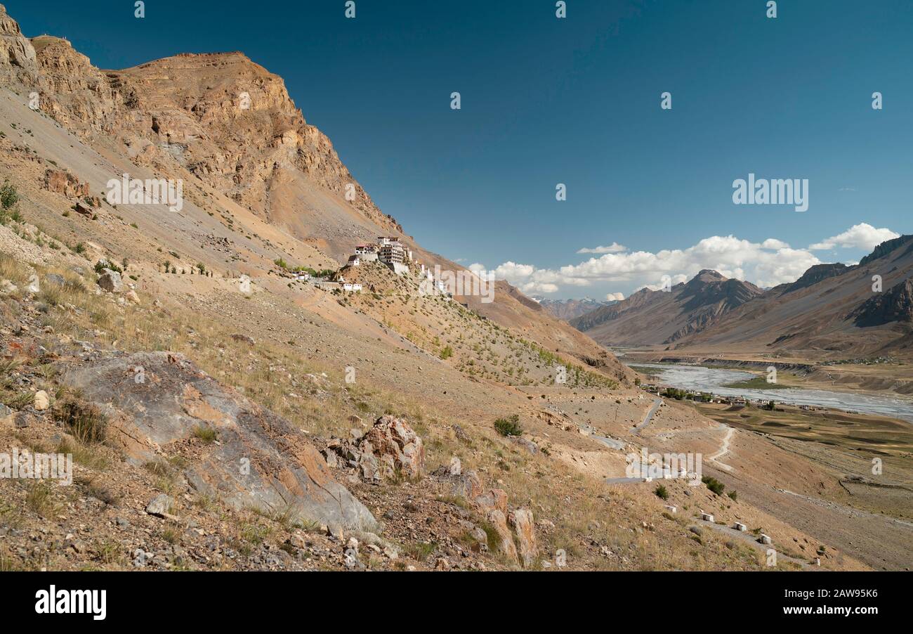 View of the ancient Key Monastery flanked by the high Himalayas and the Spiti river and valley on a summer's day near Kaza, Himachal Pradesh, India. Stock Photo