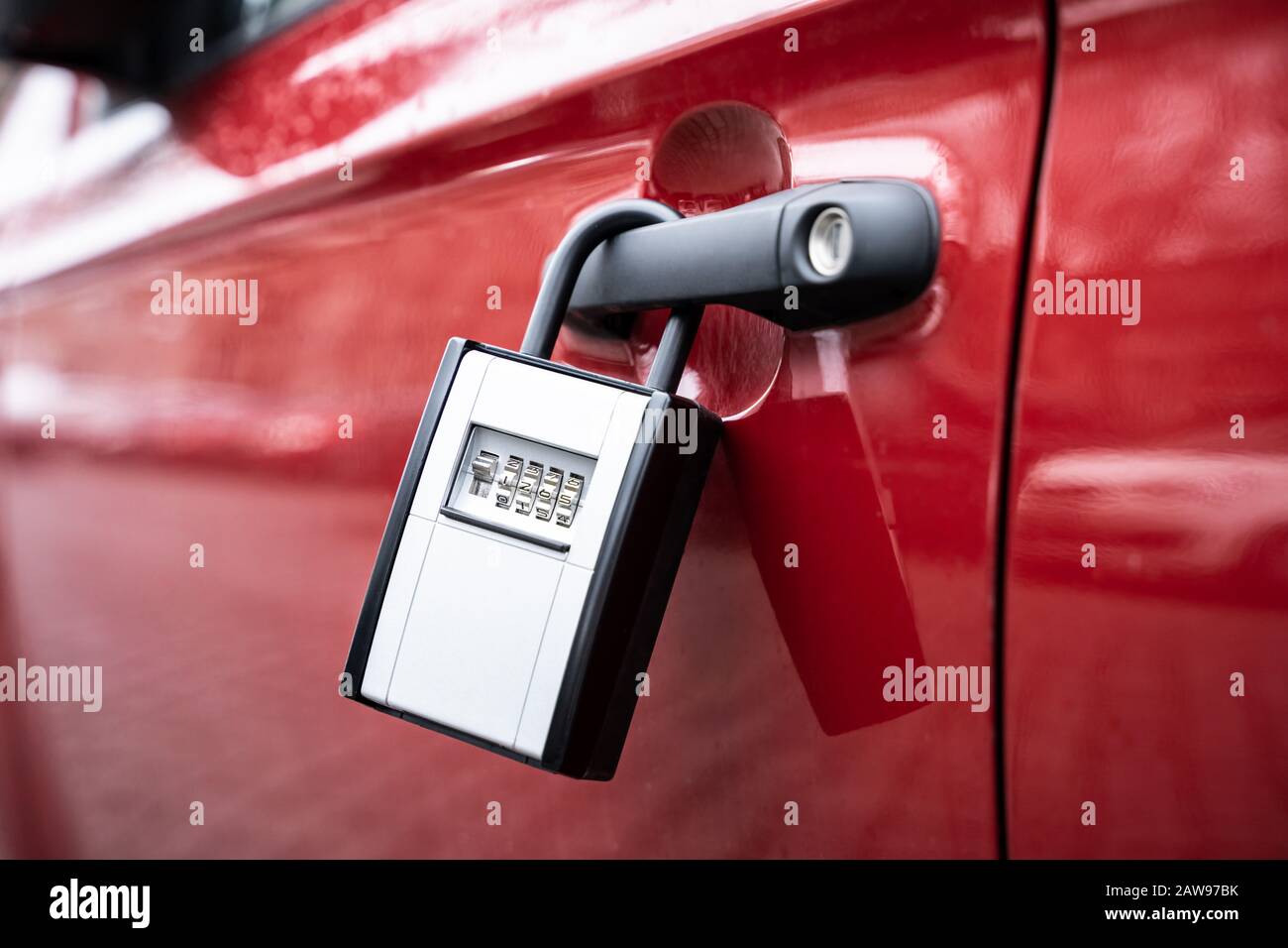 Key Safe Hanging On The Car Door With Keys Securely Stored Inside Stock Photo Alamy