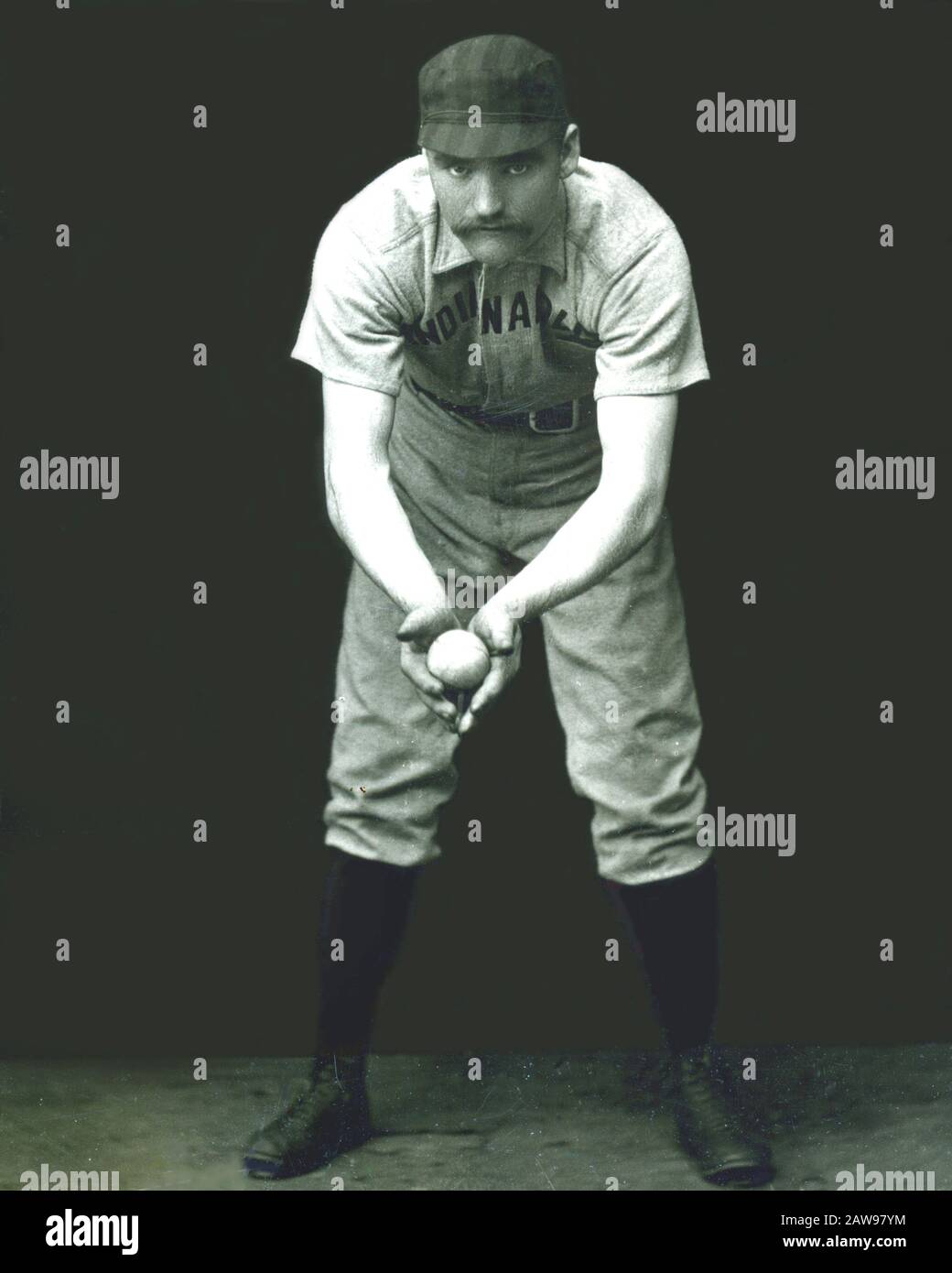 John Thomas 'Tug' Arundel in 1887 MLB catcher for the Indianapolis Hoosiers is pictured here as he appeared on Old Judge, Gypsy Queen tobacco cards Stock Photo