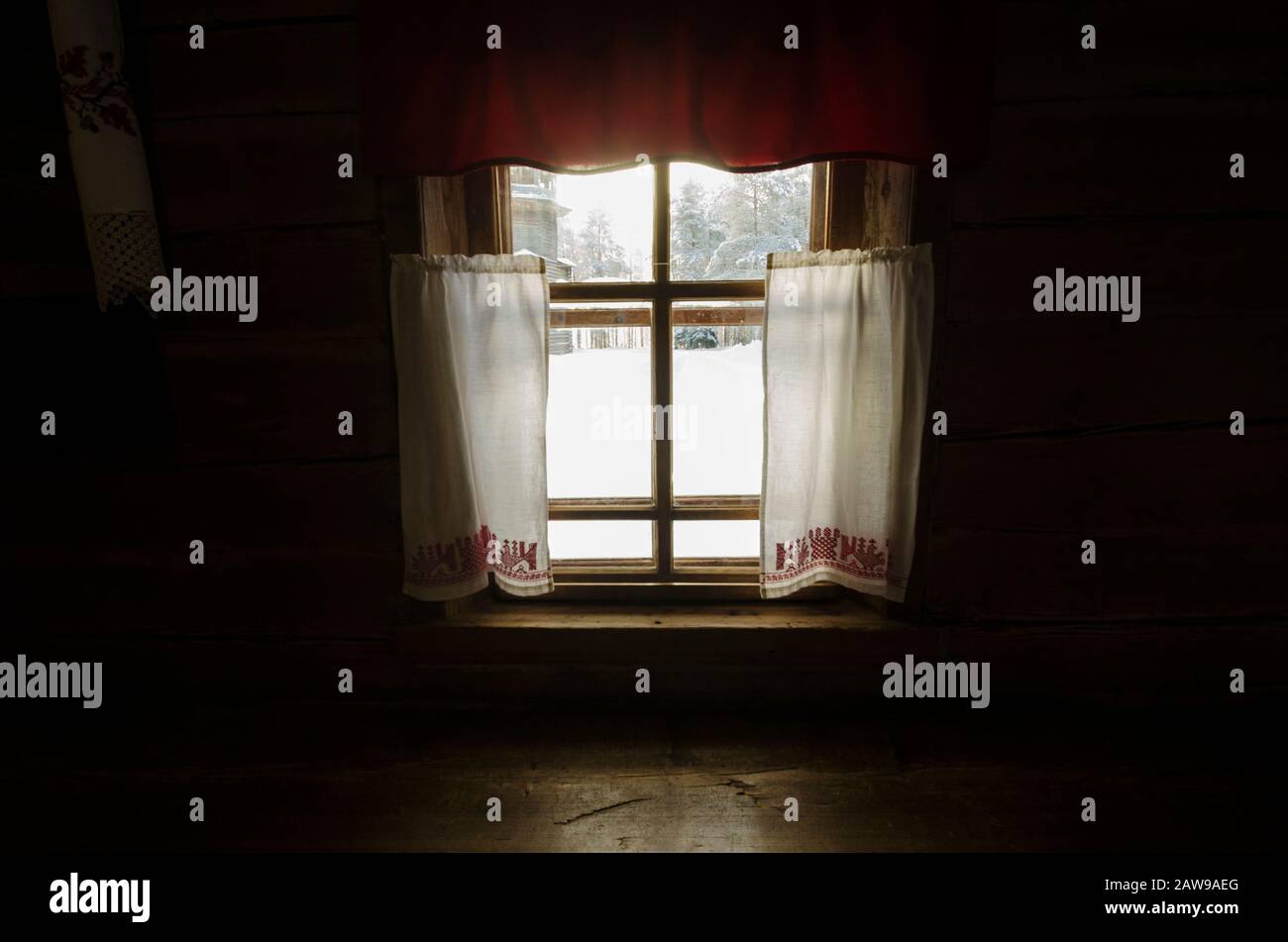 Window in a warm house with curtains. Home comfort Stock Photo