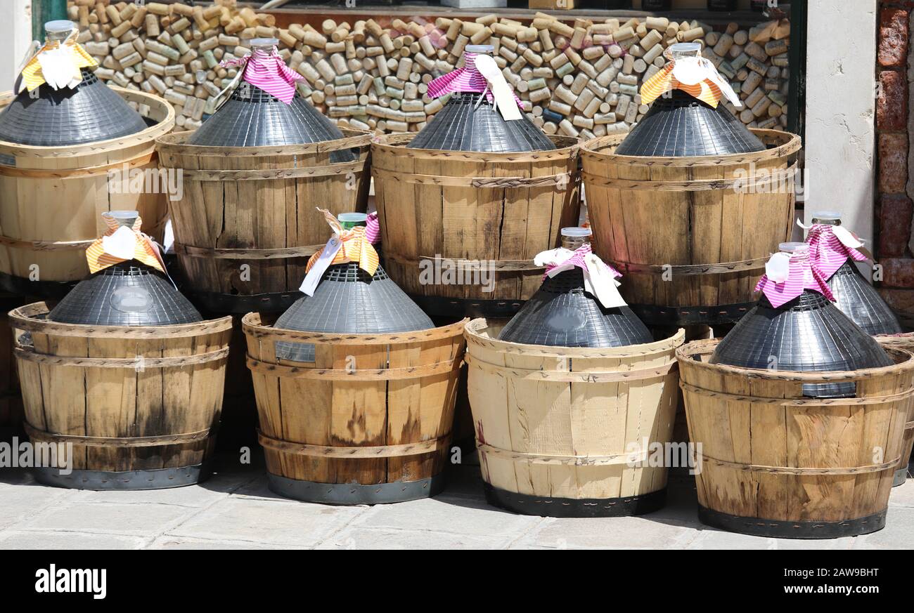 Eight big demijohns also called carboys full of wine Stock Photo Alamy