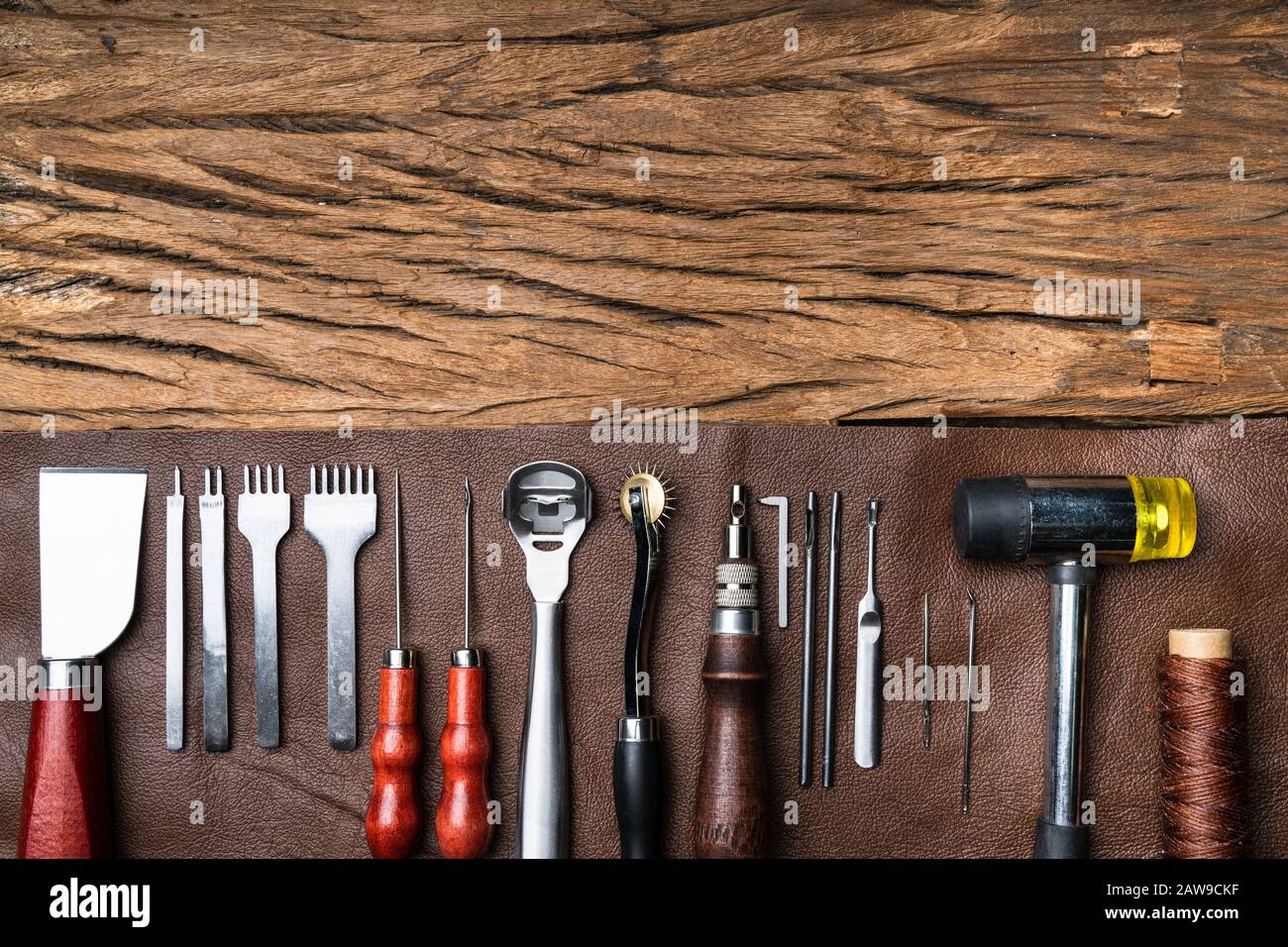 Leather Craft Tools On Desk In Tailoring Workshop Stock Photo