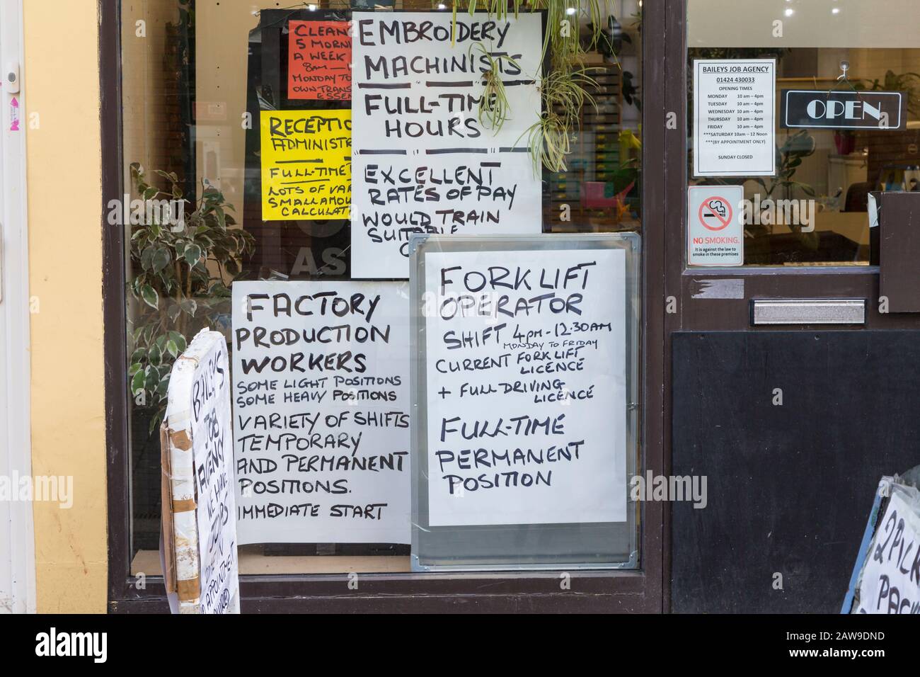 Job agency advert window advertising work, hastings, east sussex, uk Stock Photo