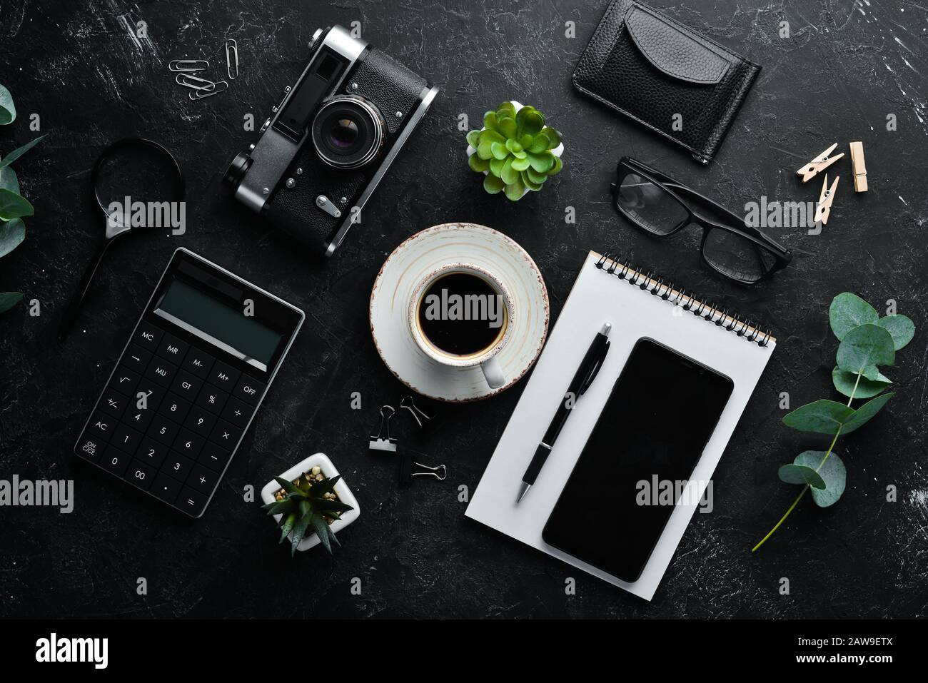 Black office desk table. Flat lay, top view office table desk Stock