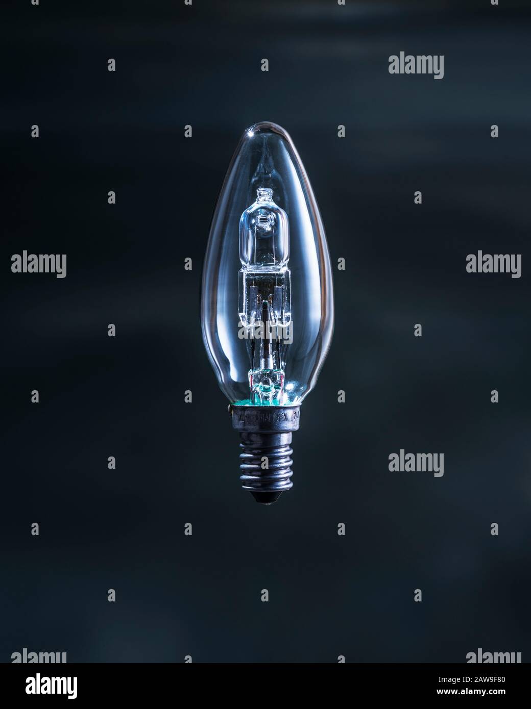 40 watt Tungsten (filament) lightbulb against a dark sky Stock Photo Alamy