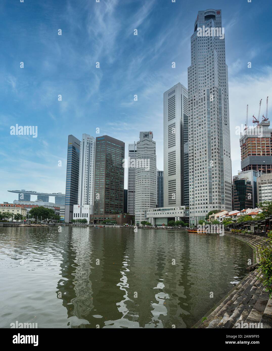 Singapore. January 2020. A view of Singapore river with the skyscrapers on the background Stock Photo