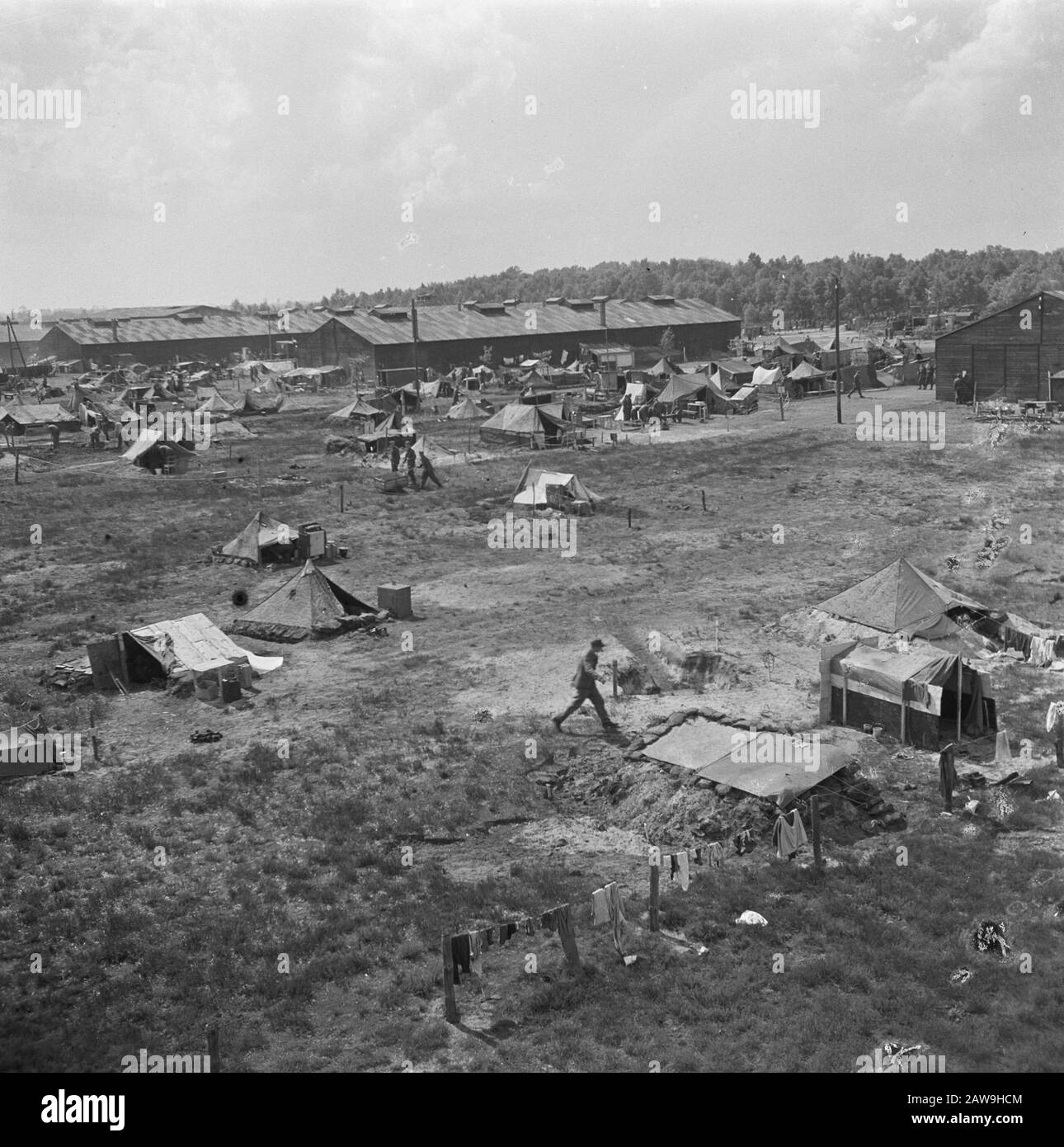Capitulation: Harskamp [camp where SS and National Guards are interned]  Overview of the camp Annotation: In this camp were about 4,000 Dutch SS prisoners housed (including Army, Landstorm , Viking, Germania, Holl Grüne Polizei etc.) their trials awaited. Date: June 1945 Location: Gelderland, Harskamp Keywords: internment camps, prisoner of war, military, tents Stock Photo
