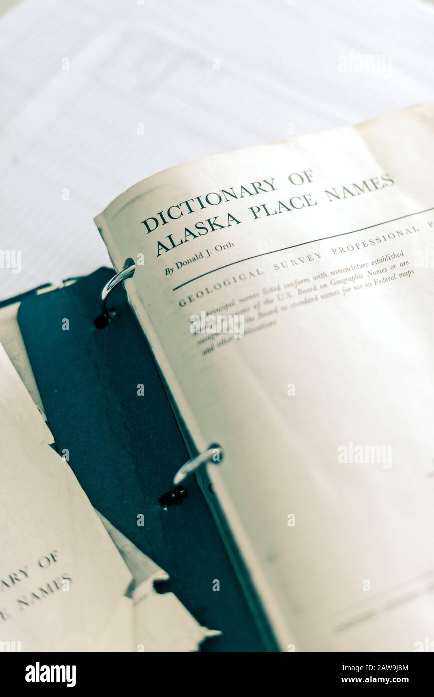 Binder containing the Alaska Place Names reference material. Stock Photo