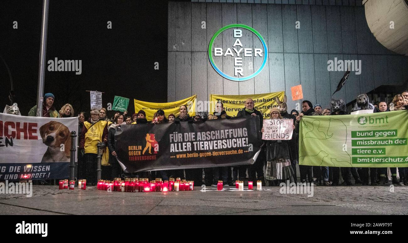 Berlin, Germany. 07th Feb, 2020. Animal welfarists stand with banners at a vigil at the headquarters of Bayer AG on Müllerstraße. The animal rights activists criticise the pharmaceutical company for its test phases with animals. Credit: Paul Zinken/dpa/Alamy Live News Stock Photo