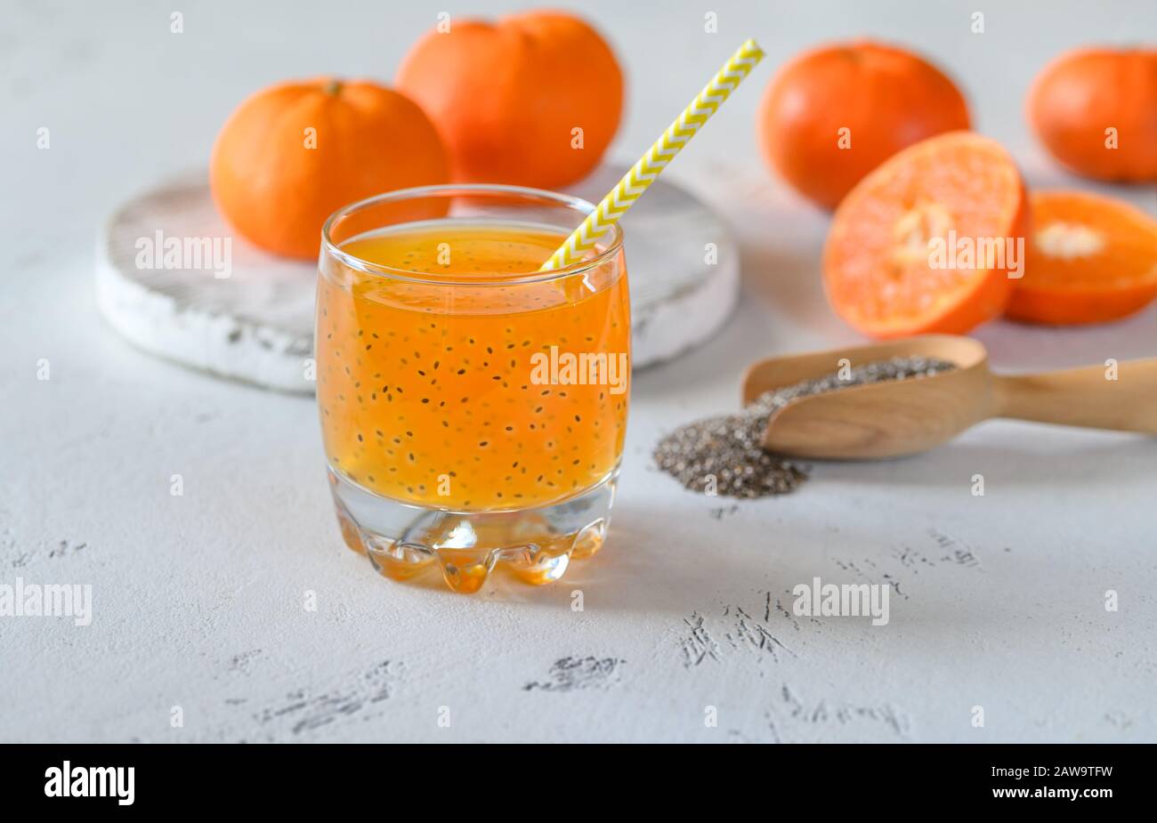 Glass of orange juice with basil seeds Stock Photo Alamy