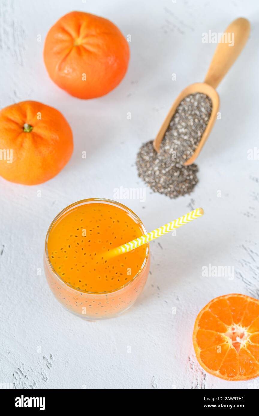 Glass of orange juice with basil seeds Stock Photo Alamy