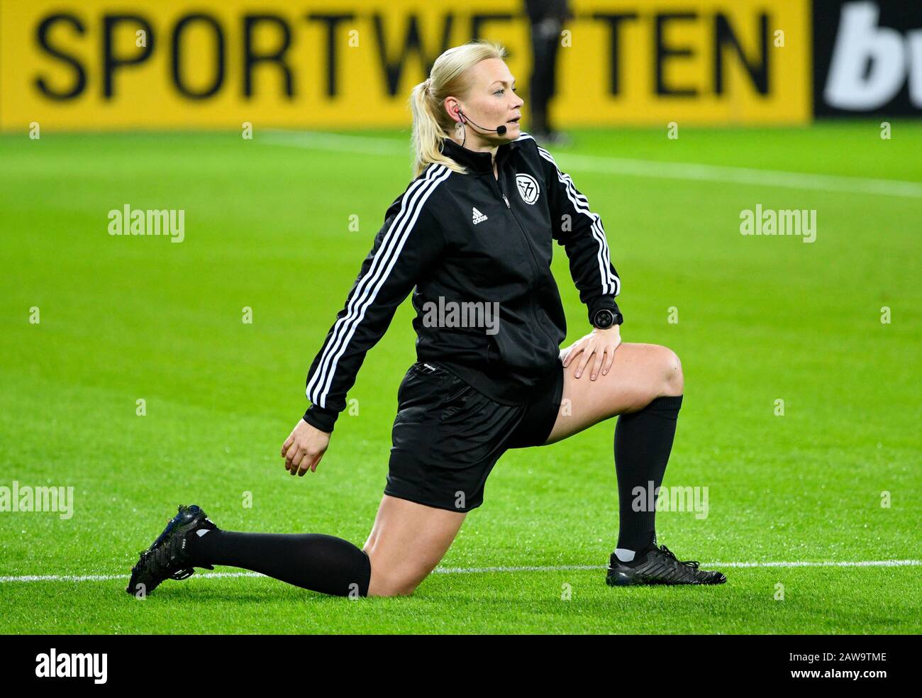 BayArena Leverkusen Germany,  5.2.2020, German football league cup Season 2019/20 round of 16,  Bayer 04 Leverkusen (B04) vs VfB Stuttgart (VFB): referree Bibiana Steinhaus stretches before the match                         DFB REGULATIONS PROHIBIT ANY USE OF PHOTOGRAPHS AS IMAGE SEQUENCES AND/OR QUASI-VIDEO Stock Photo