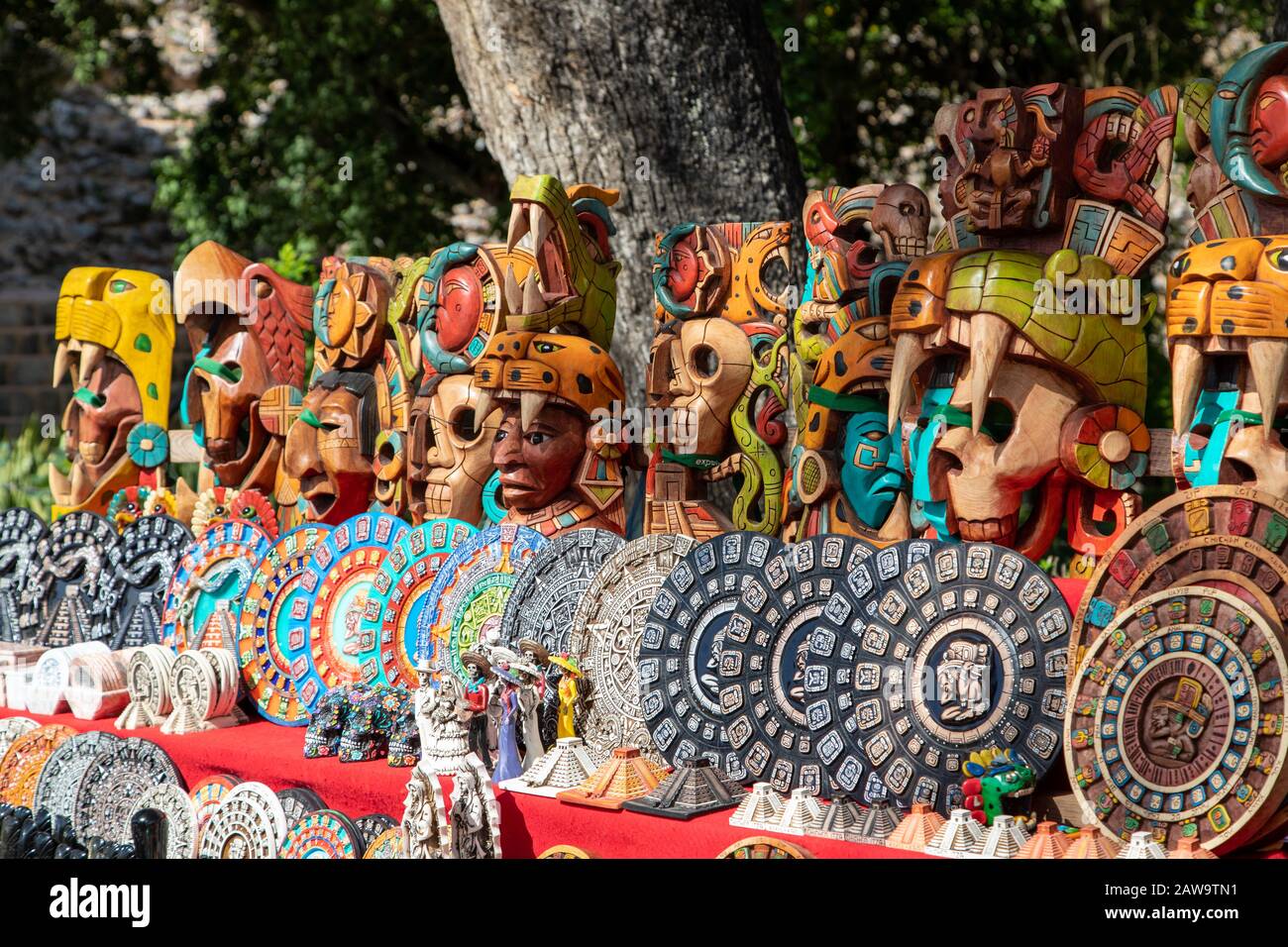Typical carved wooden souvenirs at a local Mexican market in Chichen Itza, Yucatan Peninsula, Mexico. Stock Photo
