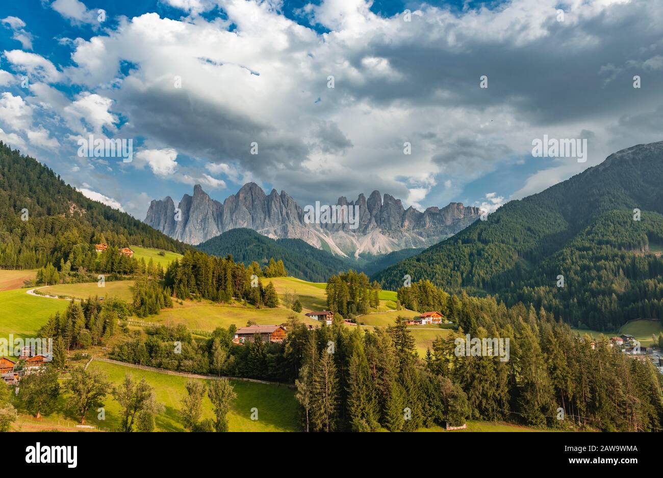 Church of St. Magdalena and Felder, Villnoesstal, in the back Geislergruppe with Sass Rigais, St. Magdalena, Bozen, South Tyrol, Italy Stock Photo