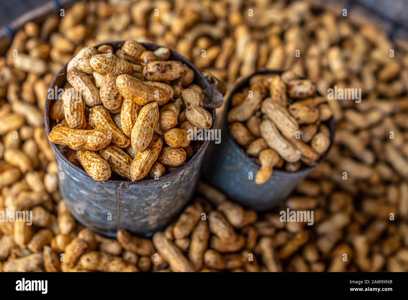 Harvested peanuts in shell sold at a fresh market Stock Photo