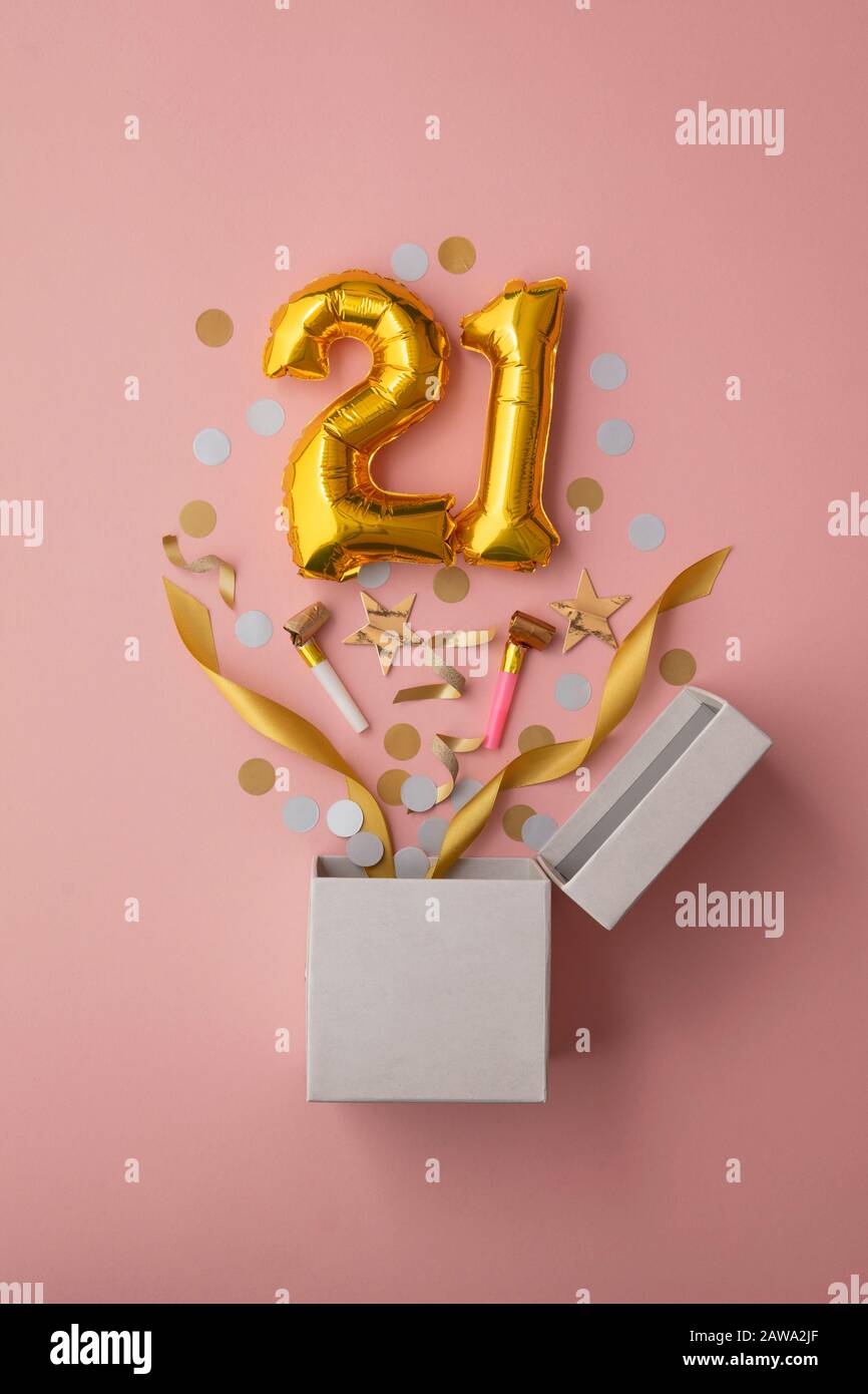Number 21 birthday balloon celebration gift box lay flat explosion Stock Photo