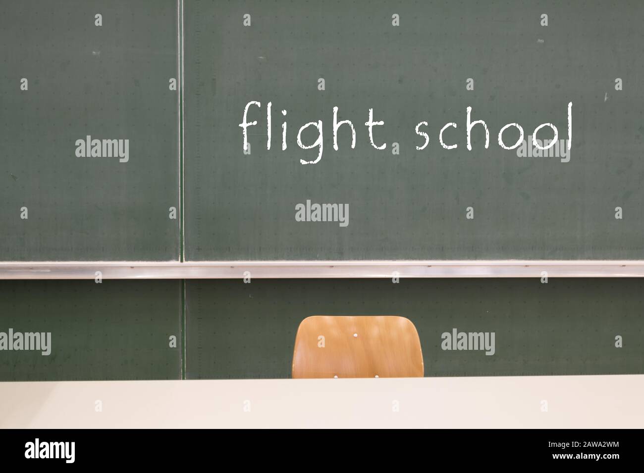 Blackboard word "Flight school" on a blackboard Stock Photo