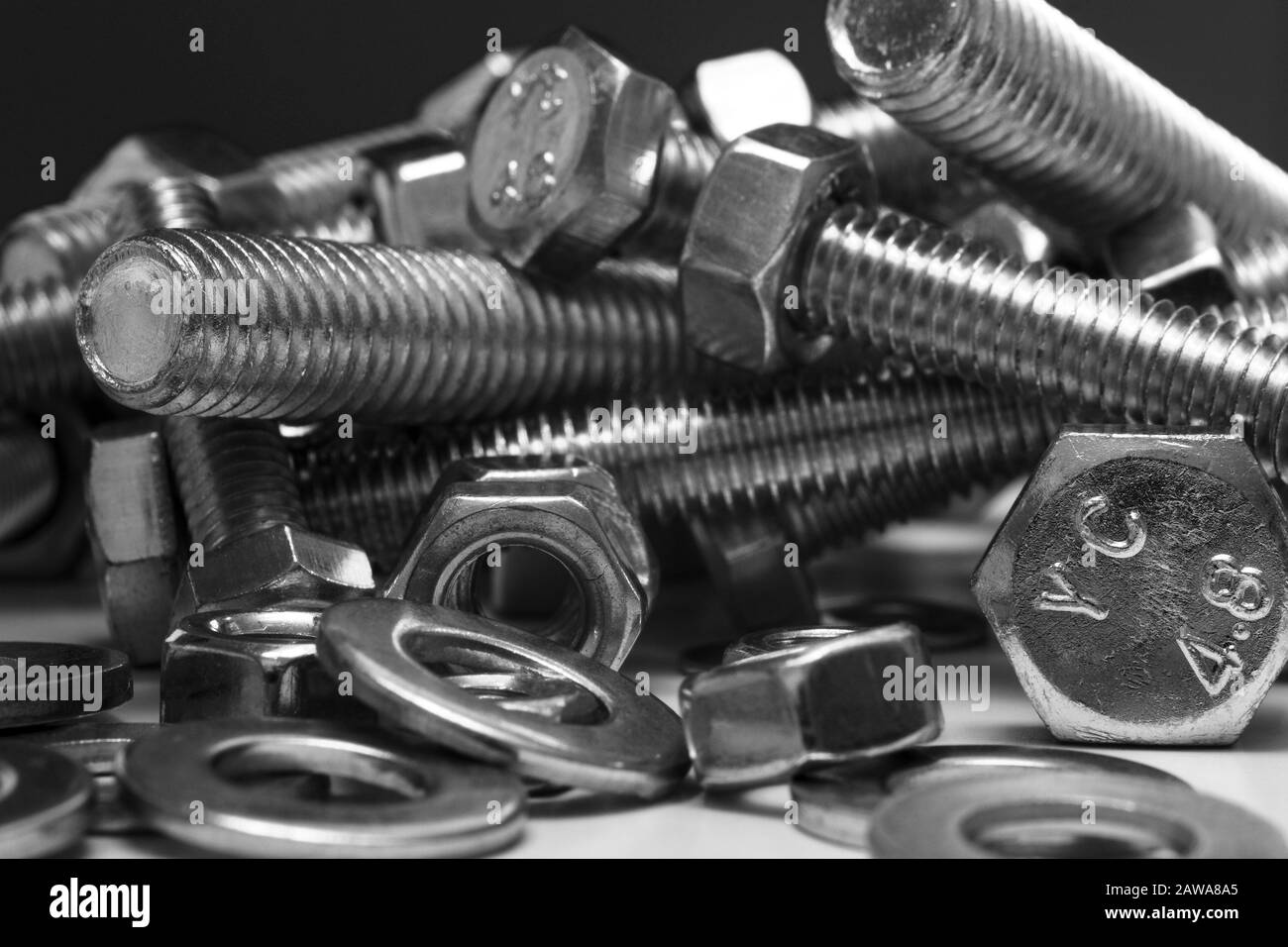 Close up macro view of steel bolts nuts and washers Stock Photo