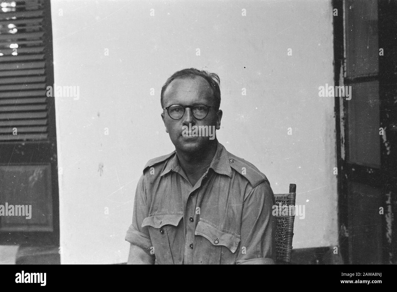 Passport Photos II  [Man with glasses in shirt without scroll passers] Date: 1947 Location: Indonesia Dutch East Indies Stock Photo
