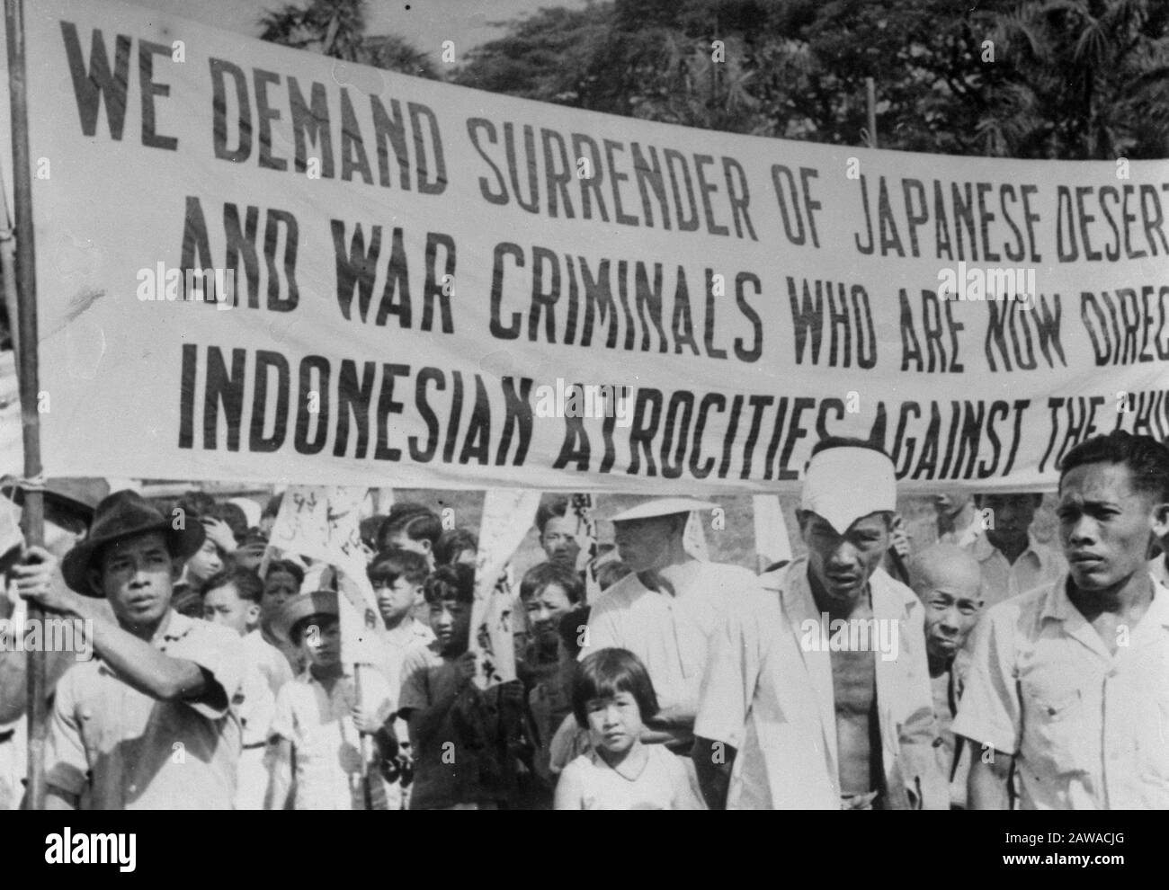 Anti-Republican demonstration Medan (reproductions)  Medan: a two kilometer procession, consisting of twelve Chinese held in Medan on September 4 a protest demonstration against the violence perpetrated by the Republic. 'We demand the extradition of Japanese deserters and war criminals who now have a guiding hand in the atrocities committed by Indonesians against Chinese' Date: September 4, 1947 Location: Indonesia, Medan, Dutch East Indies, Sumatra Stock Photo