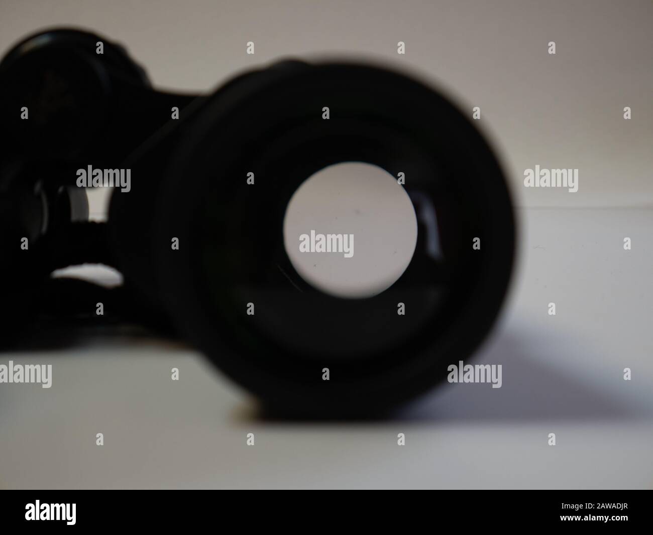 Close-up binoculars on a white background.  Stock Photo