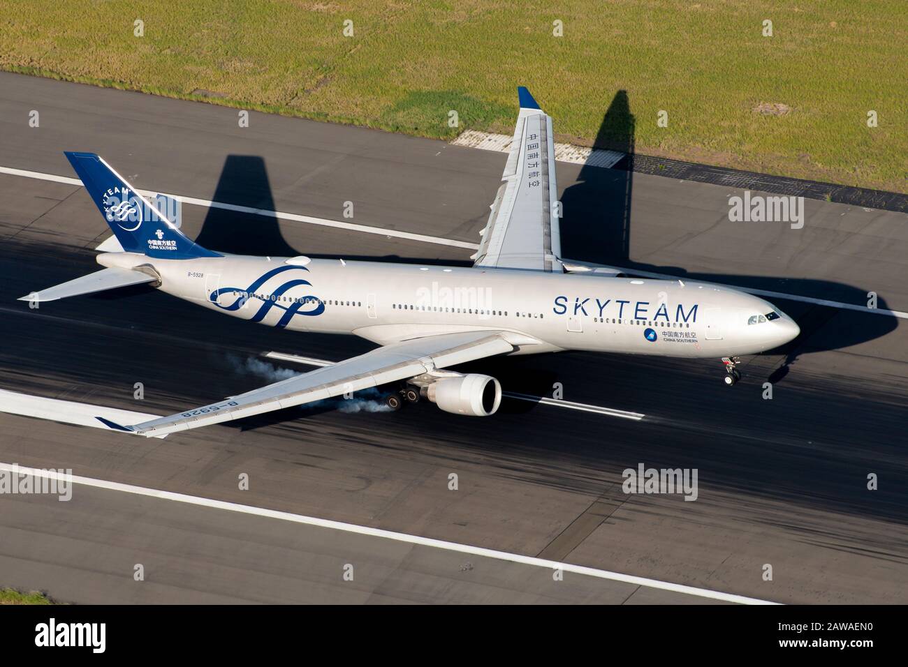 China Southern Airlines Airbus A330 widebody aircraft landing in Sydney Airport in Australia. Aircraft with SkyTeam Alliance livery. Stock Photo