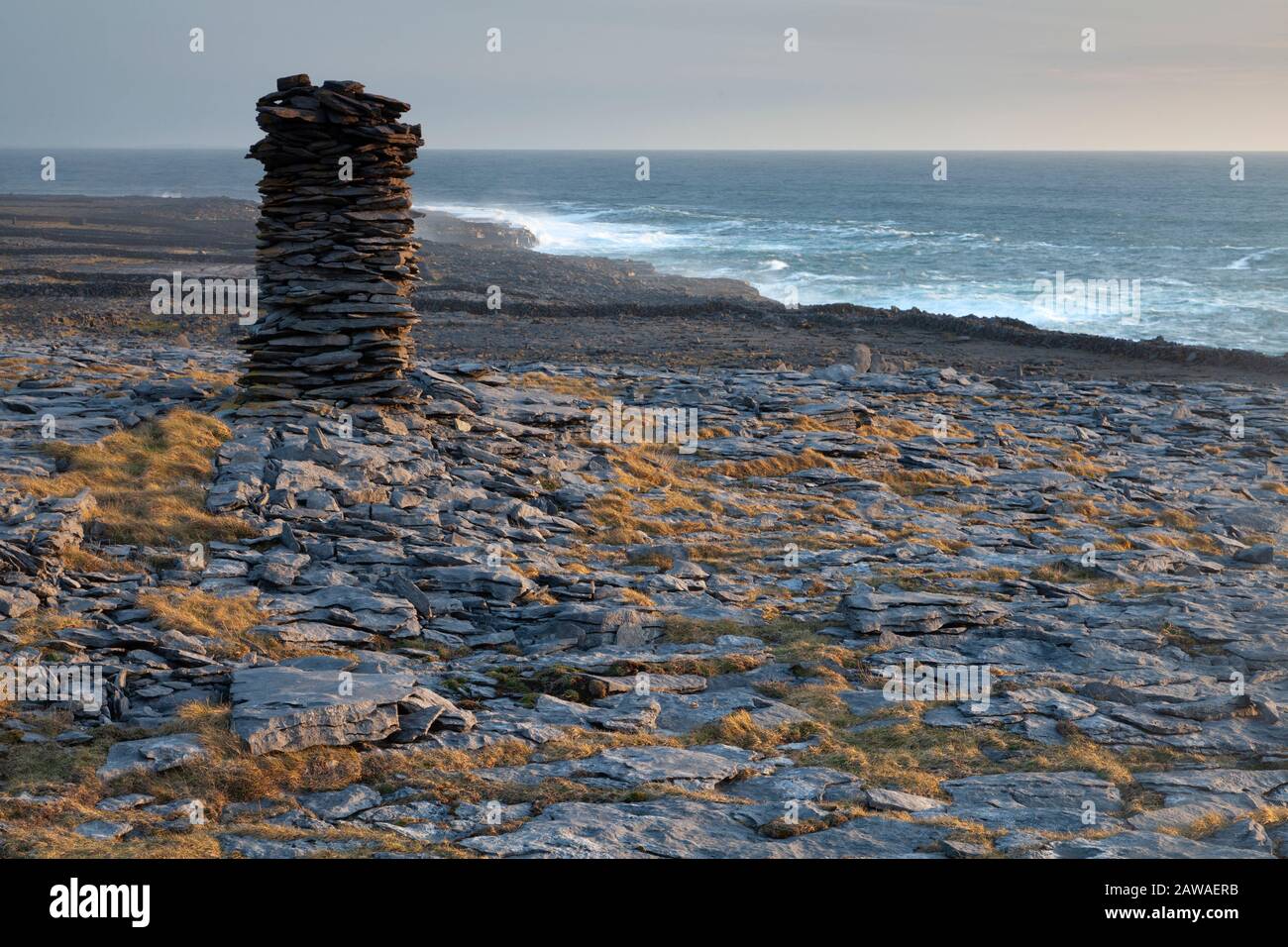 Stone monument on Inishmaan island, middle of the Aran islands on the Wild Atlantic Way in Galway Ireland Stock Photo