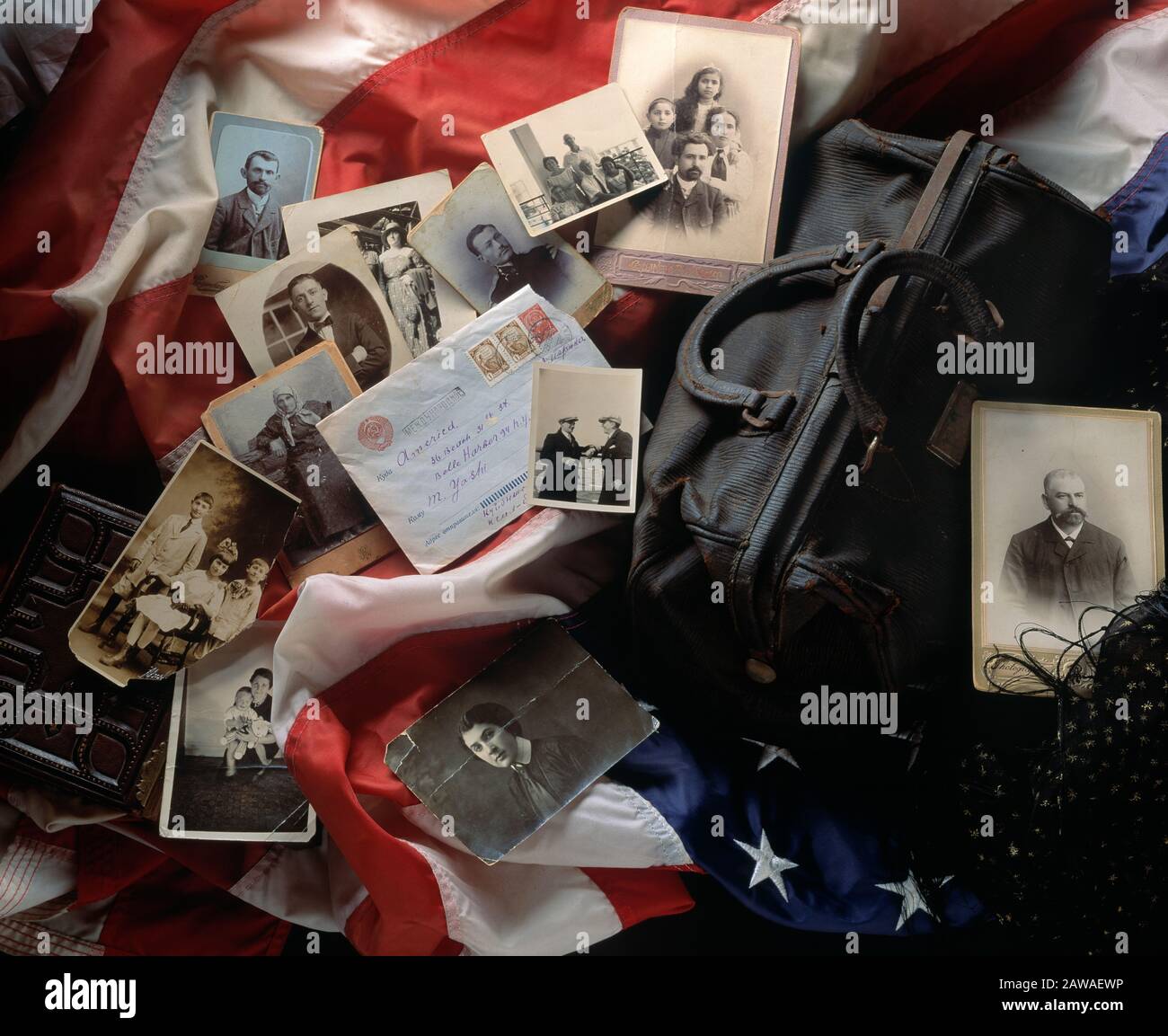 Still life of immigration papers, photos, and an American flag Stock Photo