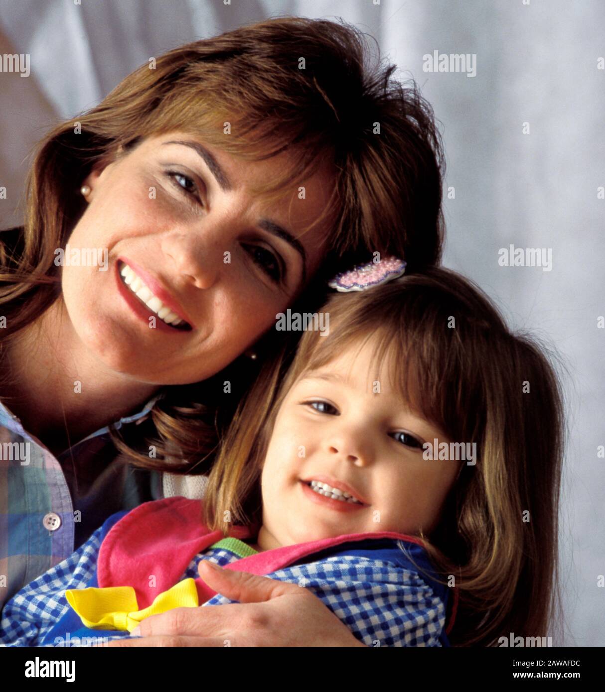 Portrait of a  smiling Caucasian mother and daughter Stock Photo