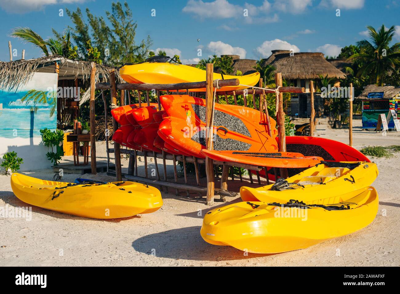 yellow kayaks on the beach in island holbox, mexico Stock Photo - Alamy