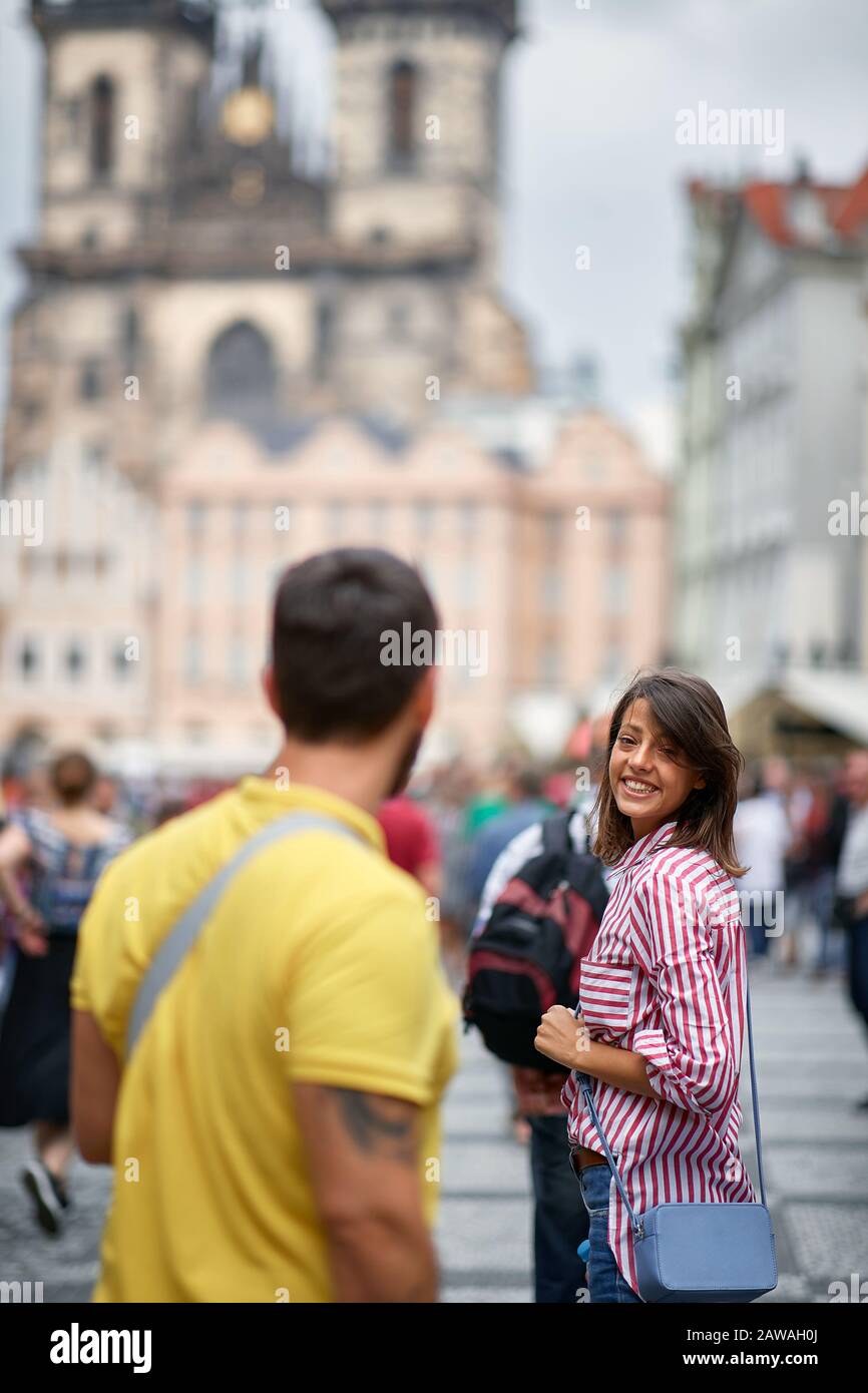 Girl  tourist walking in city streets on vacation tourism. Stock Photo