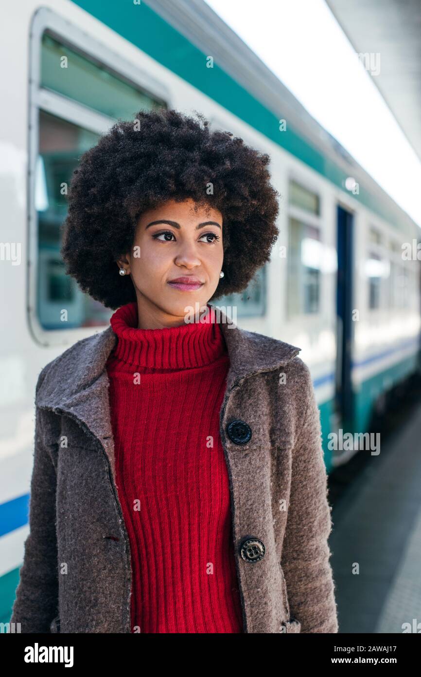 Portrait of a business woman at train station Stock Photo