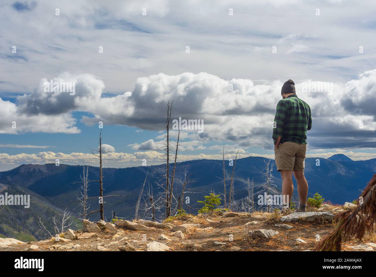 Hiker standing in moody hi-res stock photography and images - Alamy