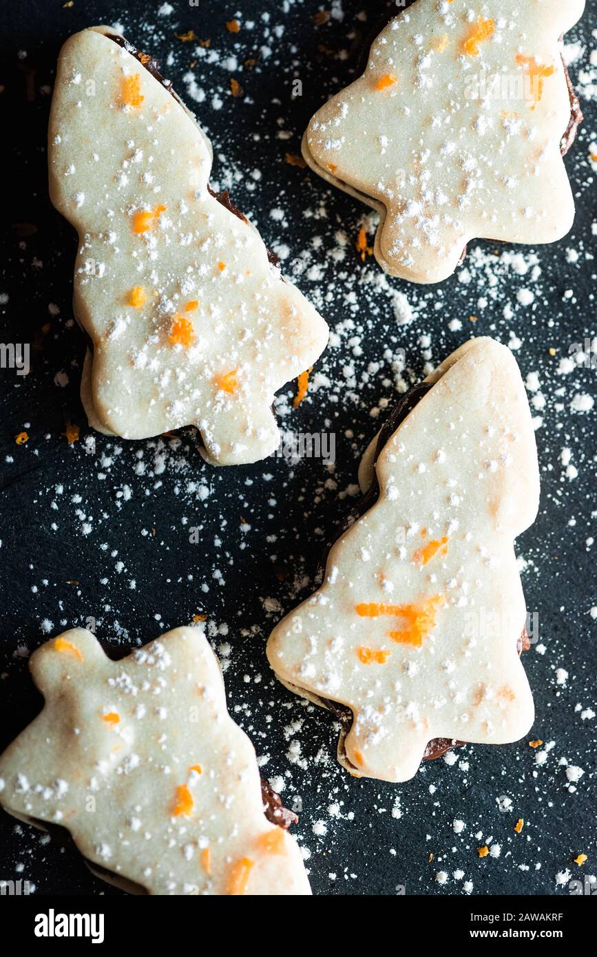 orange scented chocolate ganache butter cookies with powdered sugar Stock Photo Alamy