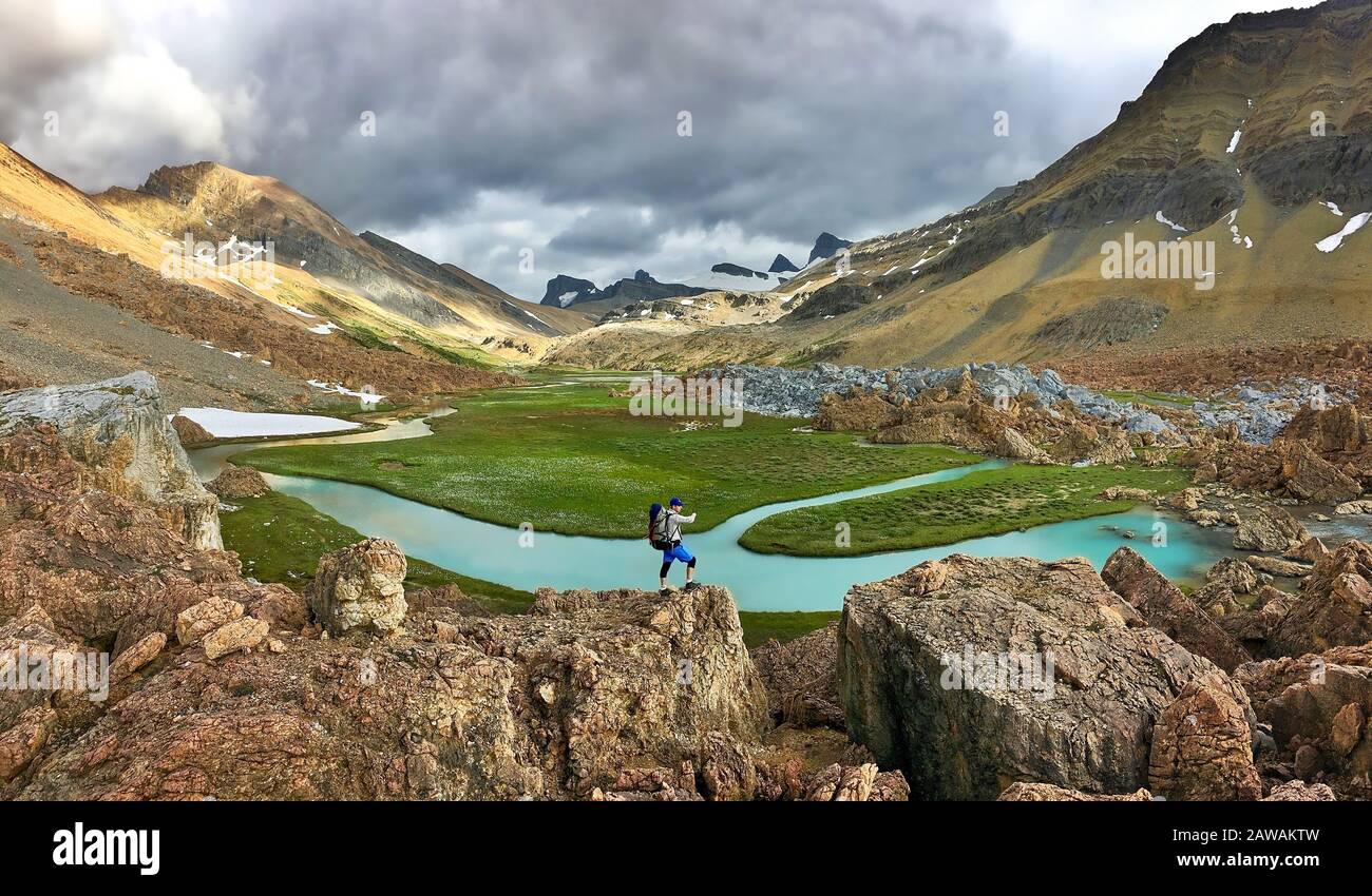 Man hiking in mountains stormy hi-res stock photography and images - Alamy