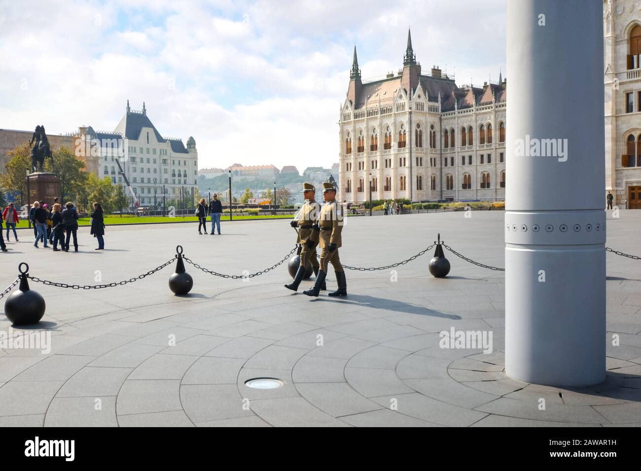 Armed, uniformed guards march in front or the Hungarian Parliament building in Budapest, Hungary Stock Photo