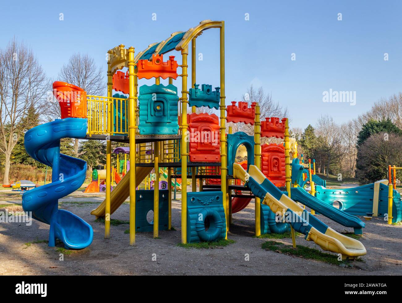 Colorful children playground park. Children's slides and playground made of  plastic material Stock Photo - Alamy