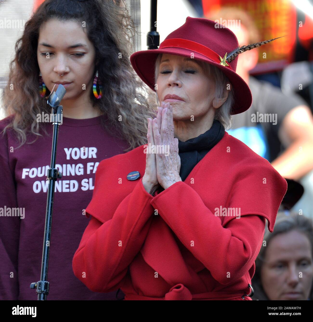 Los Angeles, California, USA. 07th Feb, 2020. Actress Jane Fonda Jane Fonda (R) gestures in prayer while standing on stage with young Gabrielino women during the Fonda-Fire Drill Friday's fossil fuel protest outside City Hall in downtown Los Angeles, California on February 7, 2020. - The Gabrielino are an indigenous group of people in Southern California during a Fired Frill Friday event outside City Hall in Los Angeles on Friday, February 7, 2020. Credit: UPI/Alamy Live News Credit: UPI/Alamy Live News Stock Photo