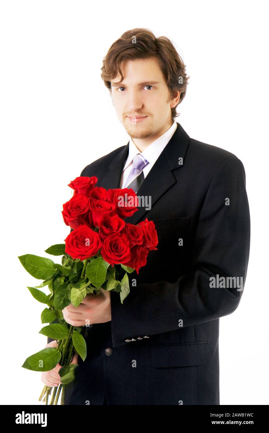 Picture of a beautiful man with a bouquet of roses Stock Photo - Alamy