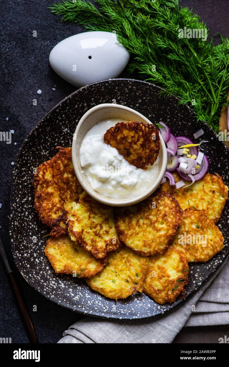 traditional ukrainian potato pancakes - deruny, served on stone ...