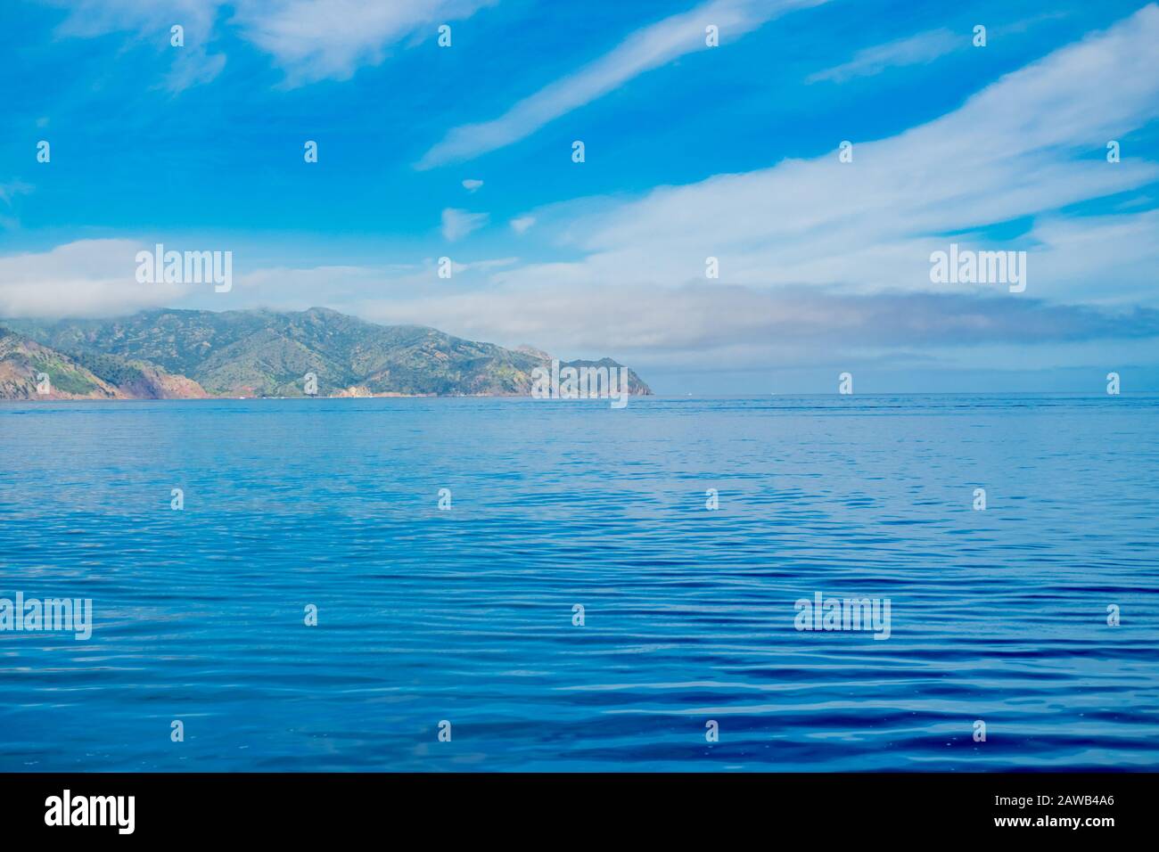 On the sea, blue sky and white clouds Stock Photo - Alamy