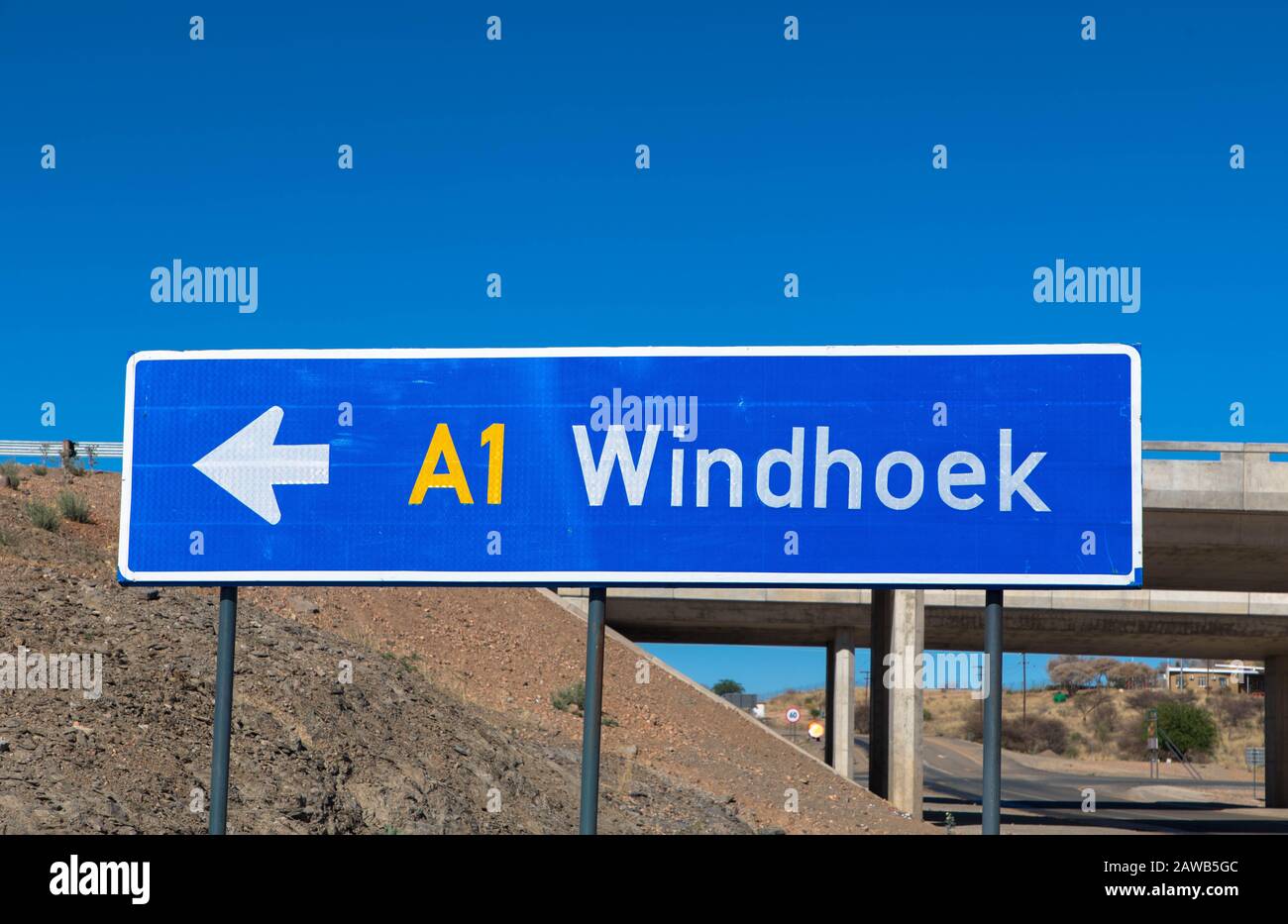 A street sign directing to Windhoek Namibia Southern Africa Stock Photo