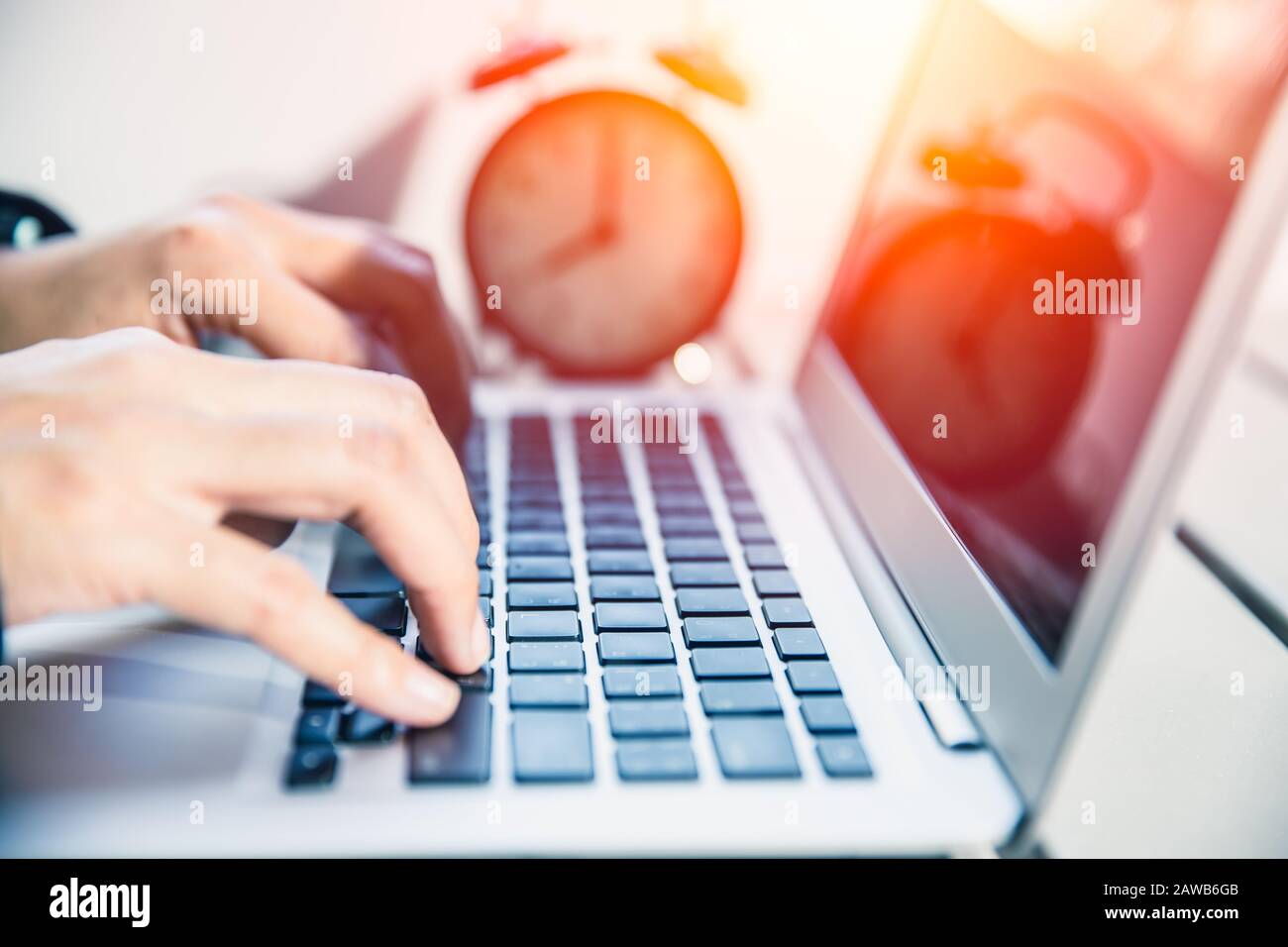 Closeup Hand Working On Laptop Computer Outdoor With Time Clock For Business Work Hours Concept Stock Photo Alamy