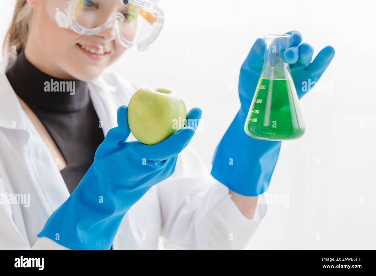 Apple vitamin extract medical food science medicine from natural fruits for safety from non-chemical formula. Stock Photo