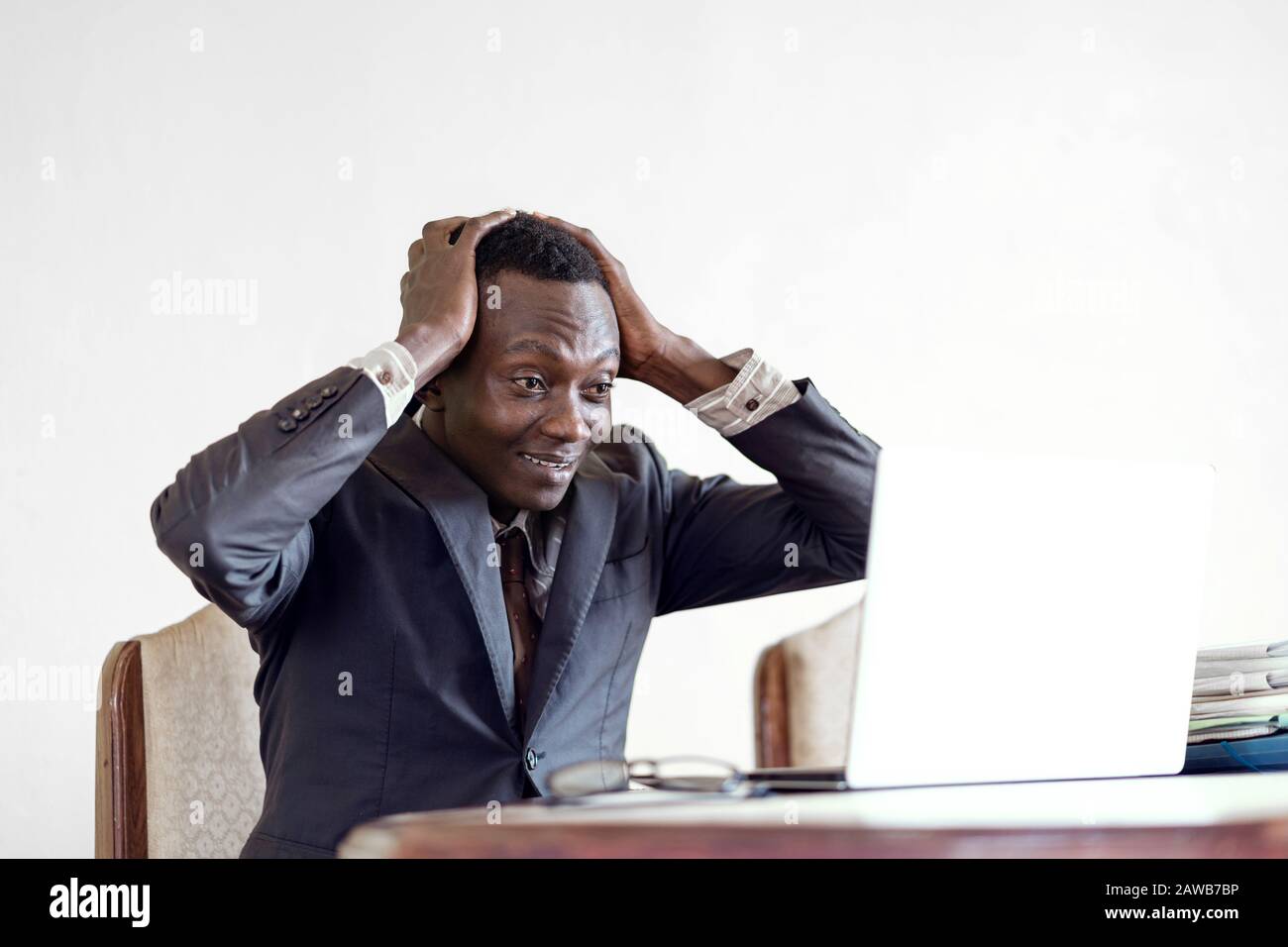 Black skinned handsome worker working employee isolated Stock Photo
