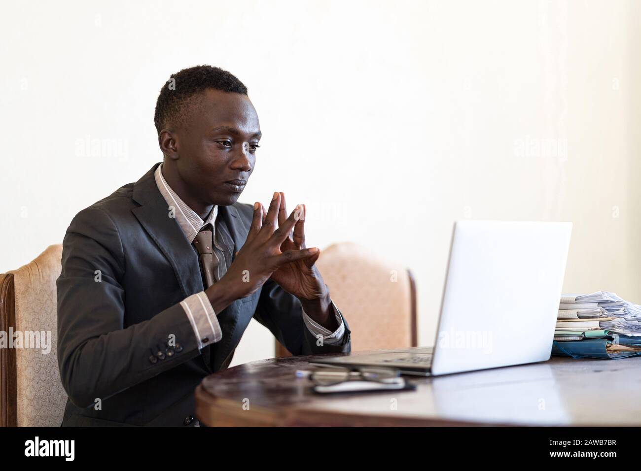 Black beautiful worker working worker looking concentrated Stock Photo