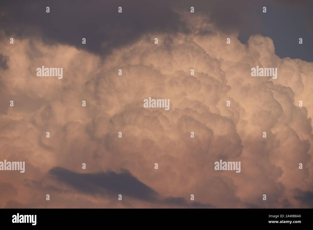 closeup of A big group of black, white and brown clouds in cloudy sky