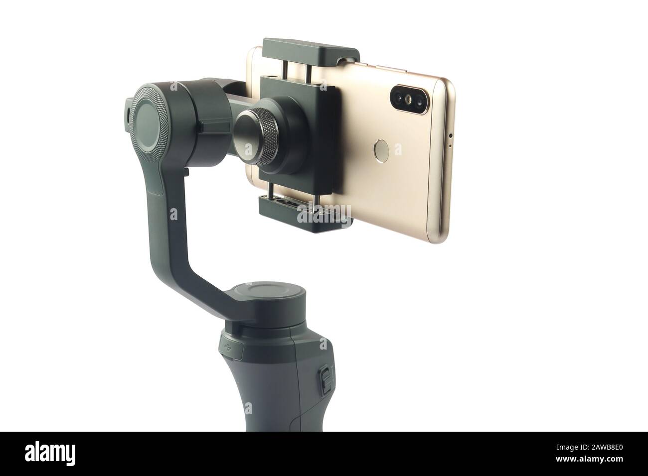 Hand holding gimbal with smartphone Stock Photo