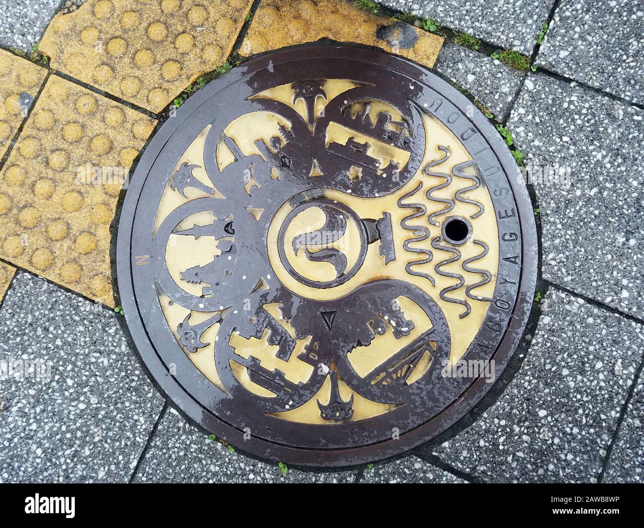Manhole cover on the street of Nagoya in Japan Stock Photo