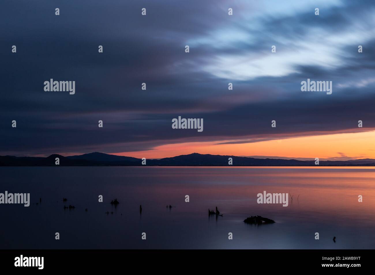Sunset a Trasimeno Lake Umbria, Italy, with Fishing Net Poles and